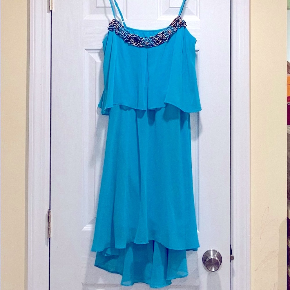 Blue Dress w/ beaded neckline Flows beautifully. Size 4